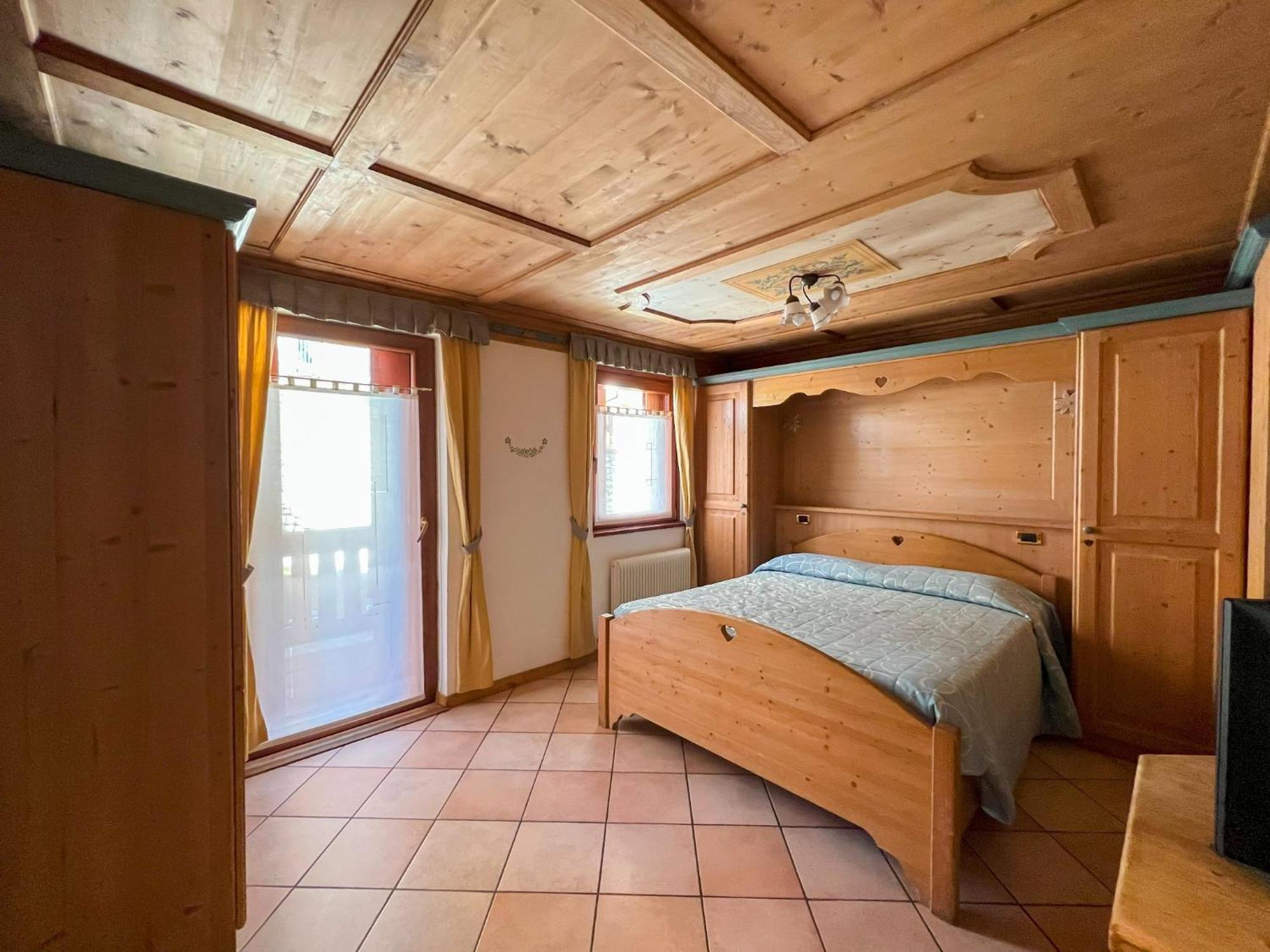 Hotel Residence Dahu Пасо дел Тонале Стая снимка
